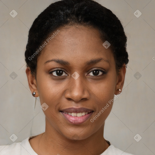 Joyful black young-adult female with short  brown hair and brown eyes