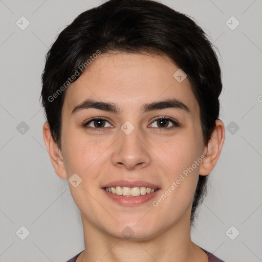 Joyful white young-adult female with short  brown hair and brown eyes