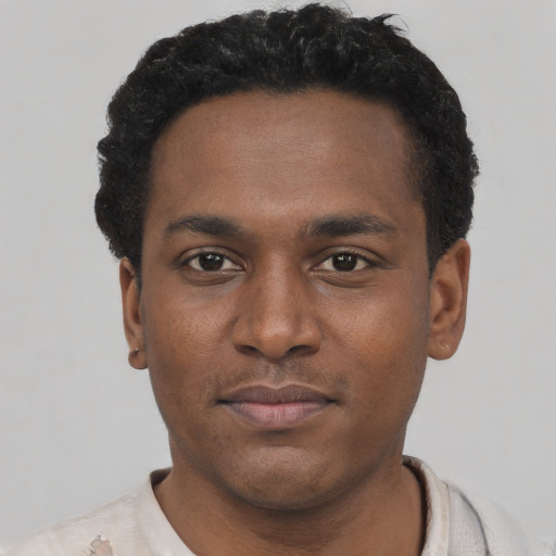 Neutral black young-adult male with short  black hair and brown eyes