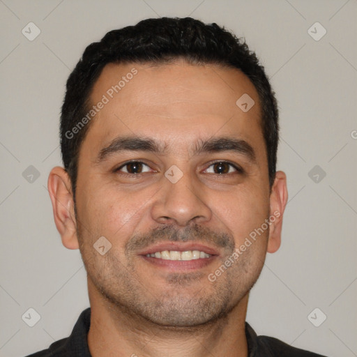 Joyful latino young-adult male with short  brown hair and brown eyes