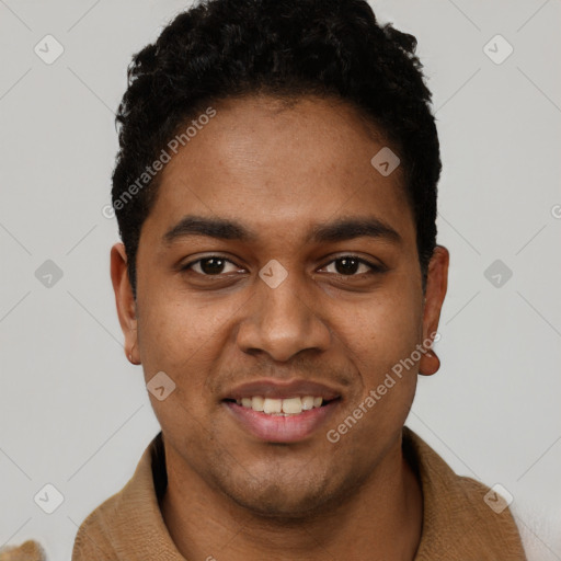 Joyful black young-adult male with short  black hair and brown eyes