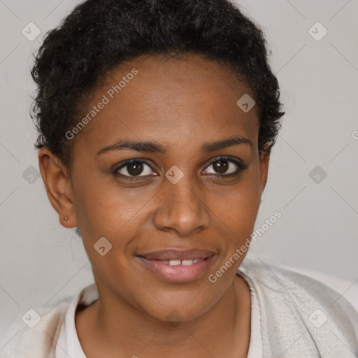 Joyful black young-adult female with short  brown hair and brown eyes