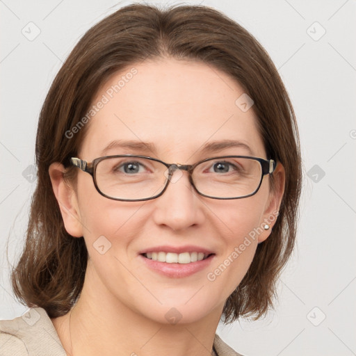 Joyful white adult female with medium  brown hair and grey eyes