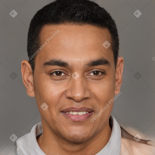 Joyful latino young-adult male with short  black hair and brown eyes