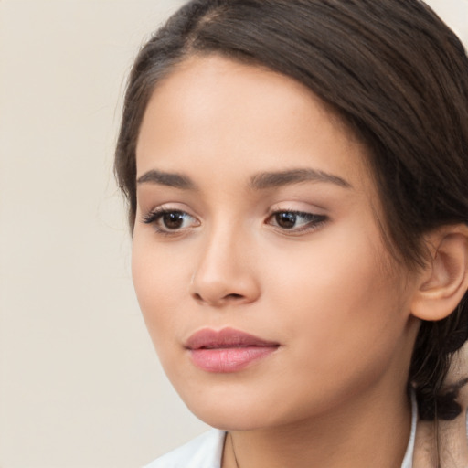 Neutral white young-adult female with long  brown hair and brown eyes