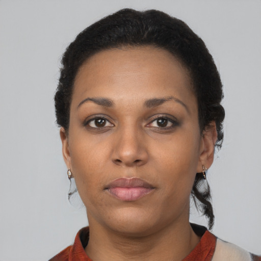 Neutral black young-adult female with short  black hair and brown eyes