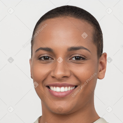 Joyful latino young-adult female with short  brown hair and brown eyes