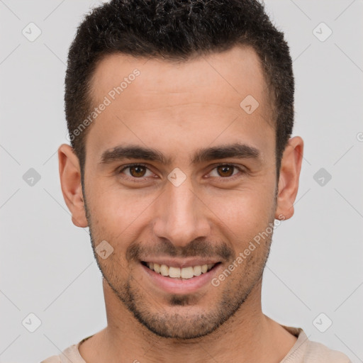 Joyful white young-adult male with short  brown hair and brown eyes