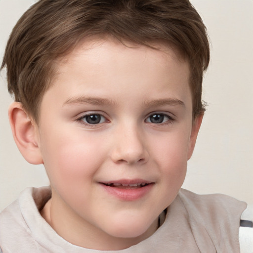 Joyful white child female with short  brown hair and brown eyes