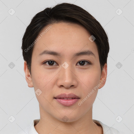 Joyful asian young-adult female with short  brown hair and brown eyes