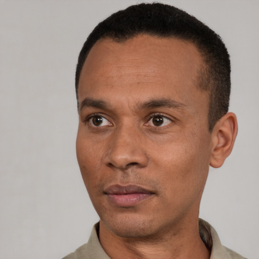 Neutral black adult male with short  black hair and brown eyes