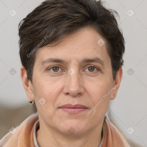 Joyful white adult male with short  brown hair and grey eyes