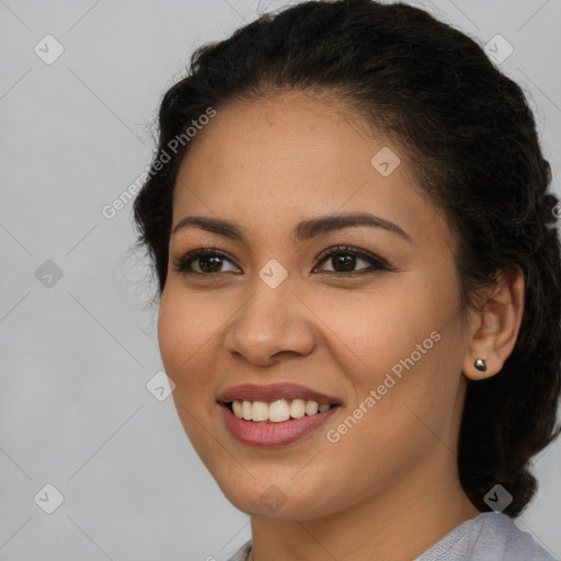 Joyful latino young-adult female with long  brown hair and brown eyes