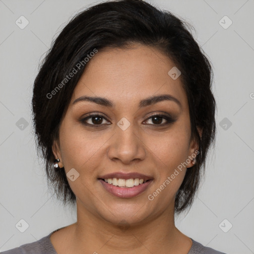 Joyful latino young-adult female with medium  brown hair and brown eyes