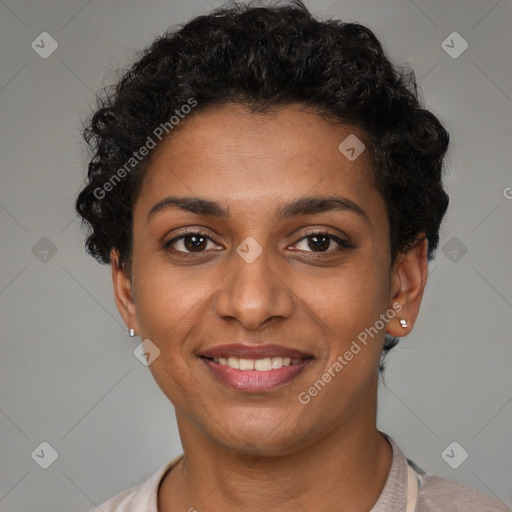 Joyful black young-adult female with short  brown hair and brown eyes