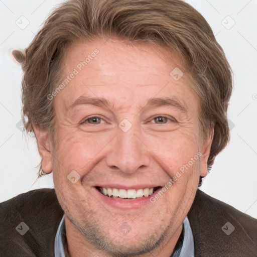 Joyful white adult male with short  brown hair and grey eyes