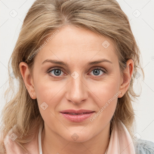 Joyful white young-adult female with medium  brown hair and blue eyes