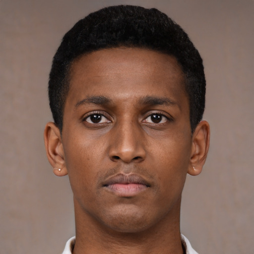 Neutral black young-adult male with short  black hair and brown eyes