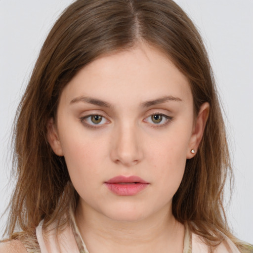 Neutral white young-adult female with medium  brown hair and brown eyes