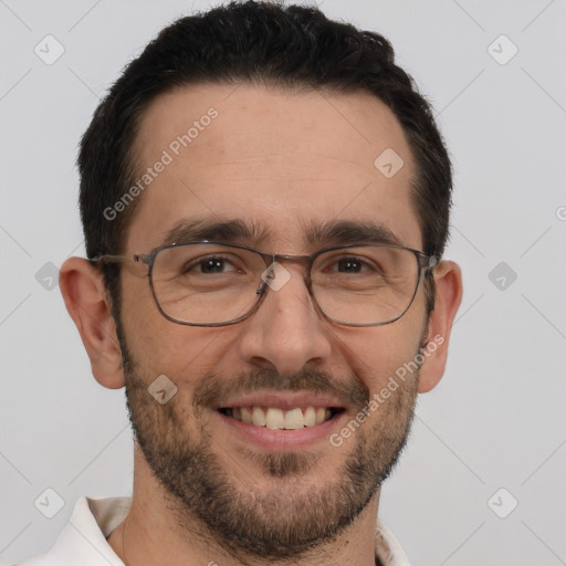 Joyful white adult male with short  brown hair and brown eyes