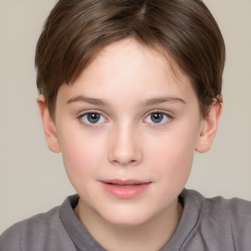 Joyful white child female with short  brown hair and brown eyes