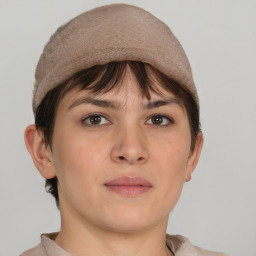 Neutral white young-adult female with short  brown hair and brown eyes