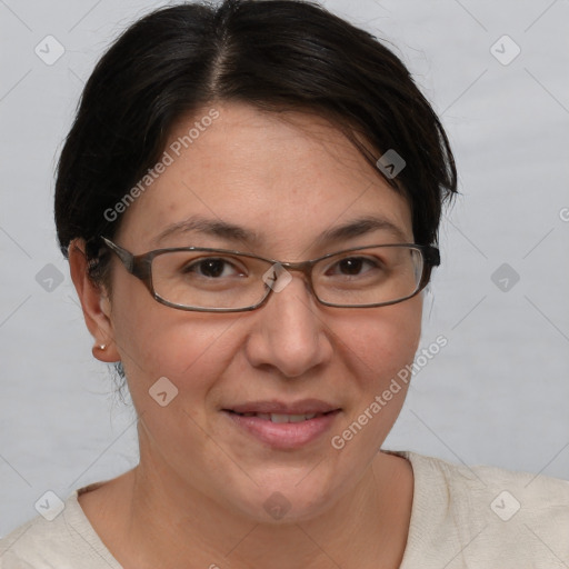 Joyful white adult female with short  brown hair and brown eyes