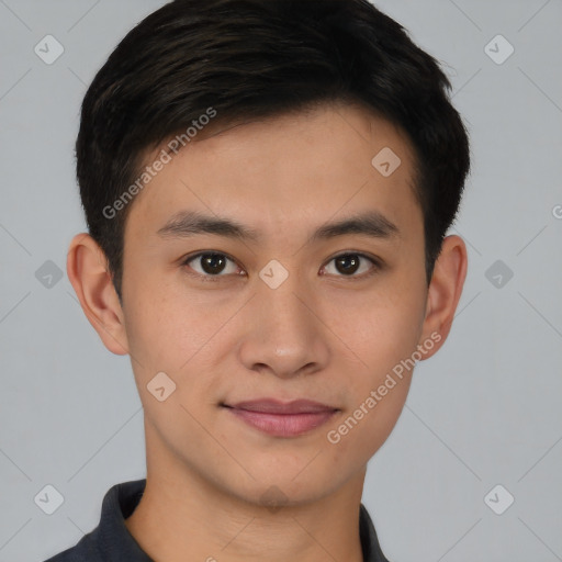 Joyful asian young-adult male with short  brown hair and brown eyes