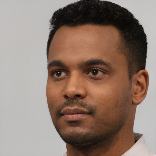 Neutral black young-adult male with short  black hair and brown eyes