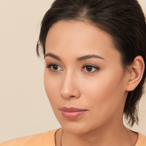 Neutral white young-adult female with medium  brown hair and brown eyes