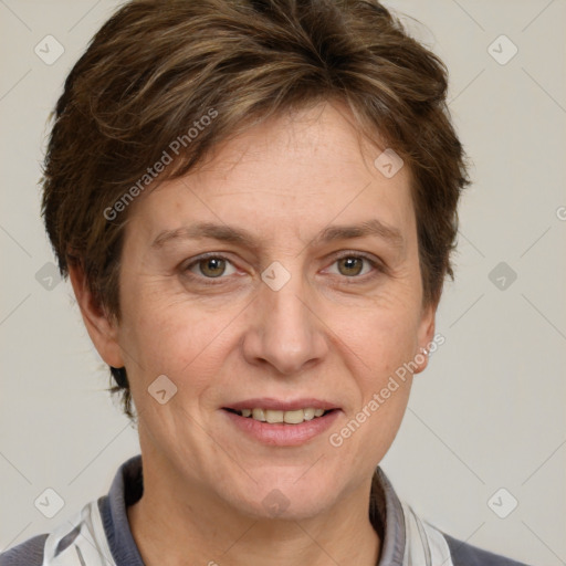 Joyful white adult female with short  brown hair and grey eyes