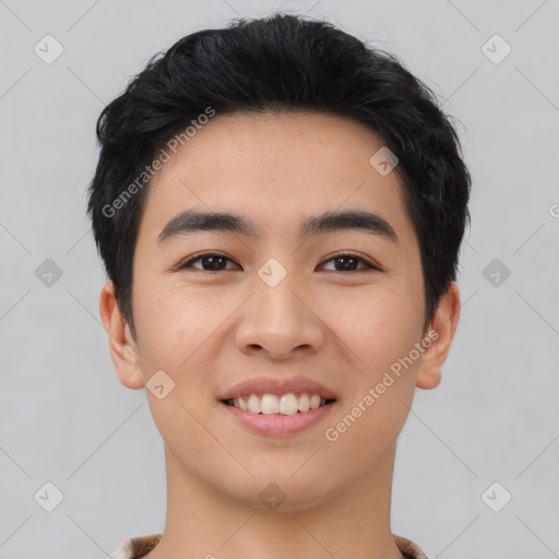 Joyful asian young-adult male with short  black hair and brown eyes