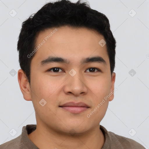 Joyful latino young-adult male with short  brown hair and brown eyes