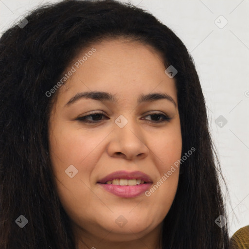 Joyful latino young-adult female with long  brown hair and brown eyes