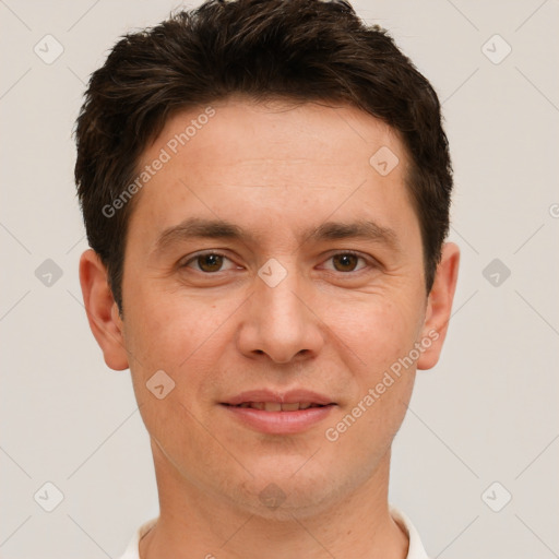 Joyful white adult male with short  brown hair and brown eyes