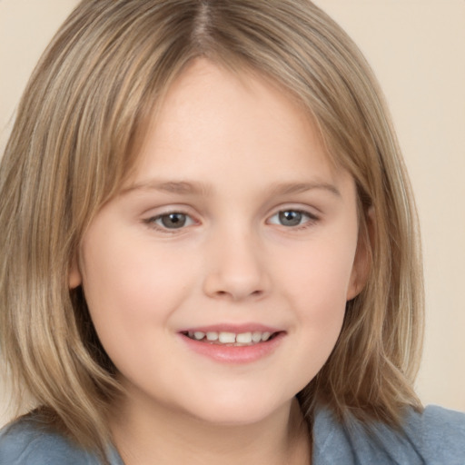 Joyful white child female with medium  brown hair and brown eyes