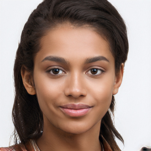 Joyful latino young-adult female with long  brown hair and brown eyes