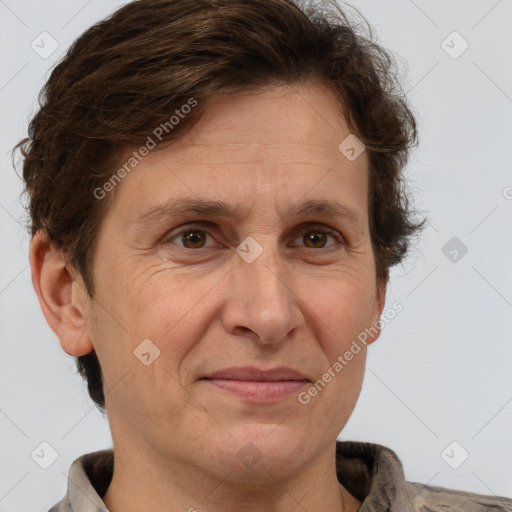 Joyful white adult male with short  brown hair and grey eyes