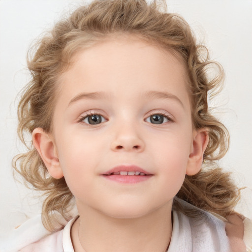 Joyful white child female with medium  brown hair and blue eyes