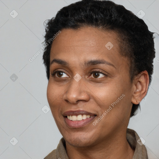 Joyful latino young-adult female with short  brown hair and brown eyes