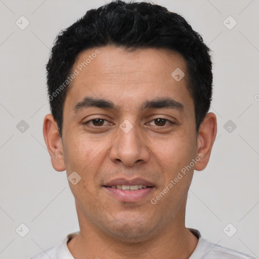 Joyful white young-adult male with short  black hair and brown eyes