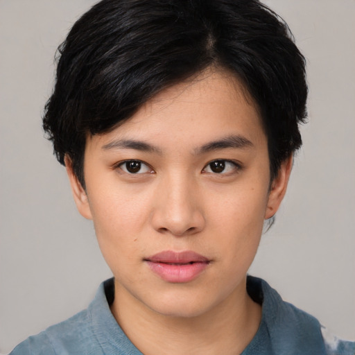 Neutral asian young-adult female with medium  black hair and brown eyes