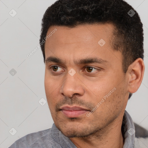 Neutral latino adult male with short  black hair and brown eyes