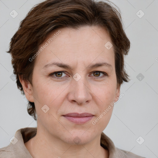 Joyful white adult female with short  brown hair and grey eyes