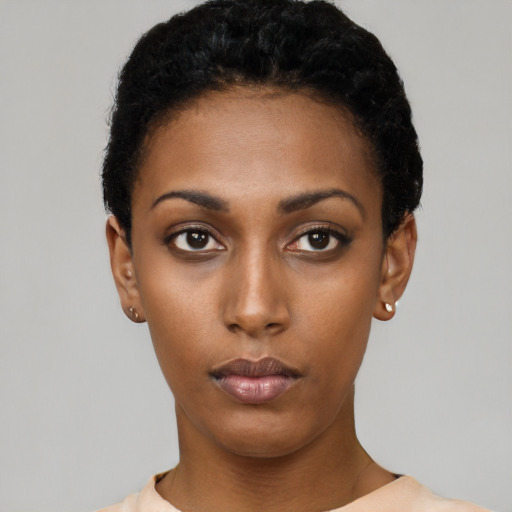 Neutral latino young-adult female with short  black hair and brown eyes