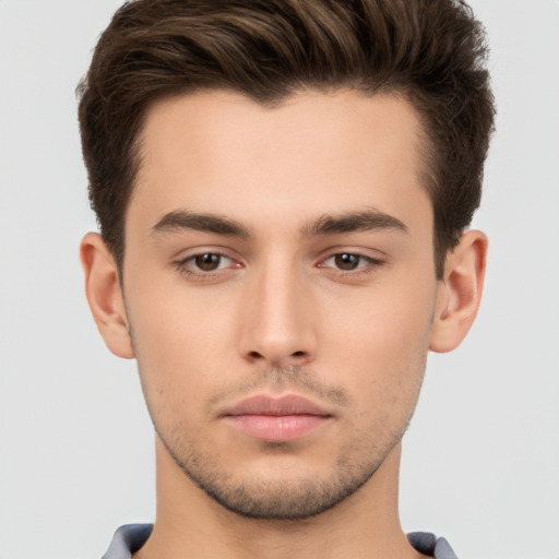 Neutral white young-adult male with short  brown hair and brown eyes