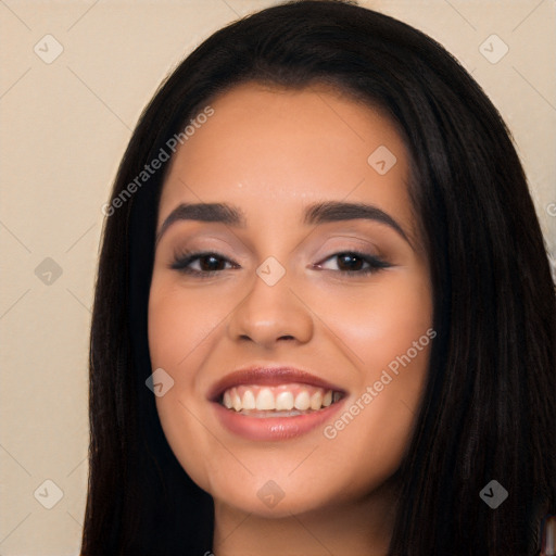 Joyful white young-adult female with long  black hair and brown eyes