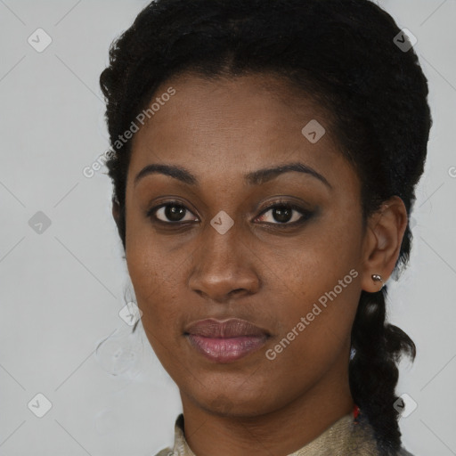 Joyful black young-adult female with medium  brown hair and brown eyes