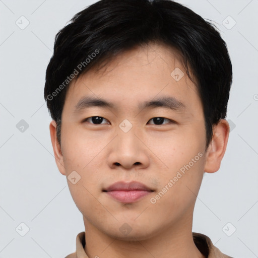 Neutral asian young-adult male with short  black hair and brown eyes