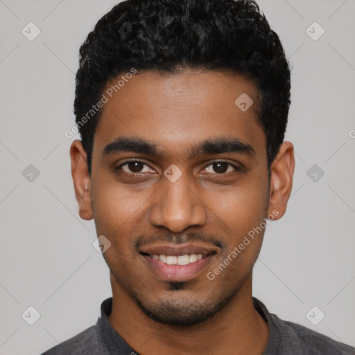 Joyful black young-adult male with short  black hair and brown eyes